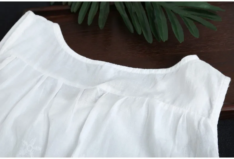 AUTUMN SLEEVELESS SMOCK TOP WITH BROIDERY HEM